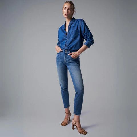 women wearing denim top styled with denim jeans