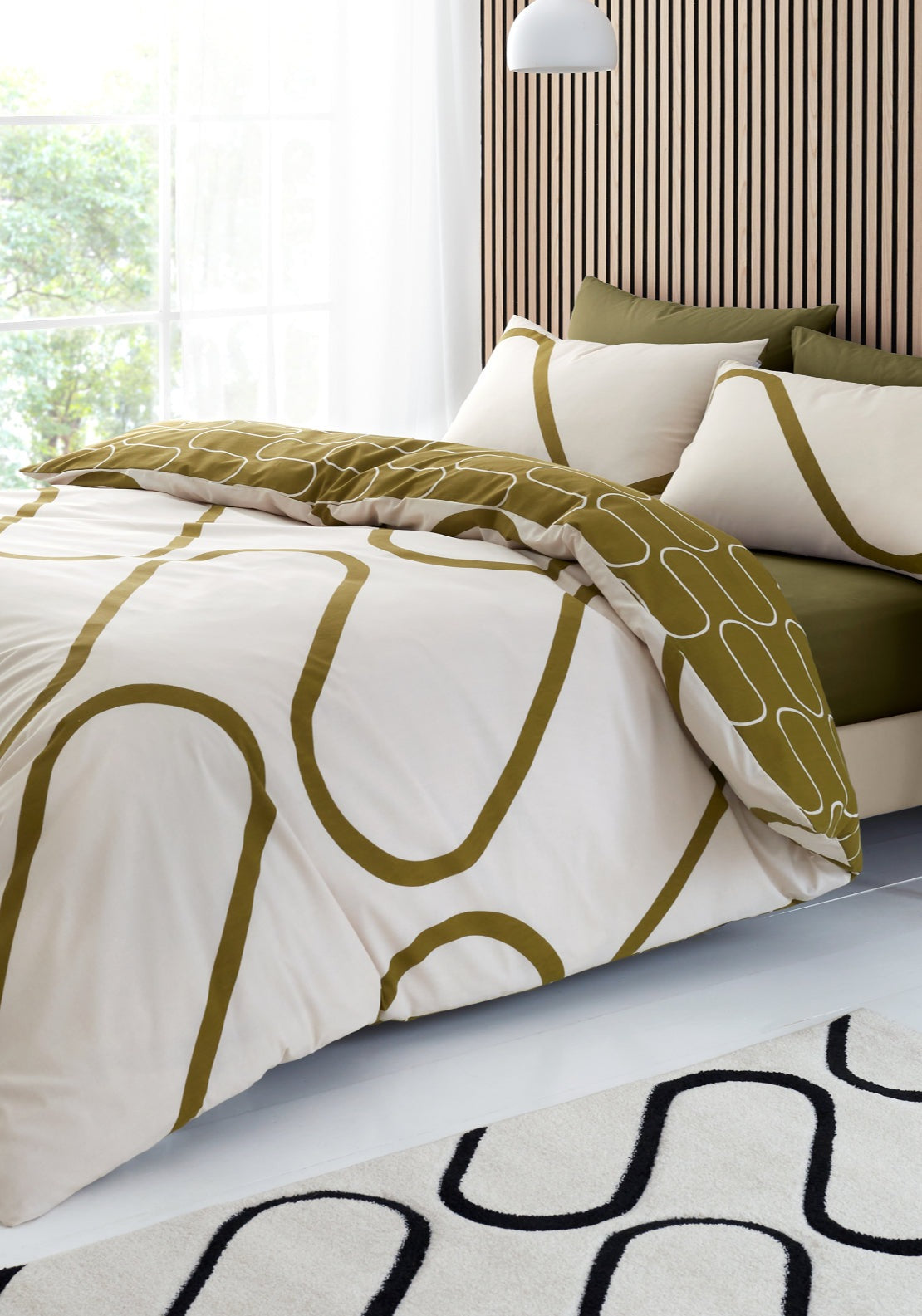 Catherine Lansfield Linear Curve Geometric Reversible Duvet Cover Set - Green 1 Shaws Department Stores