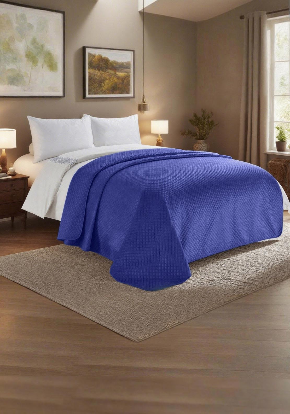 The Home Collection Quilted Velvet Pinsonic Throw - Blue 1 Shaws Department Stores