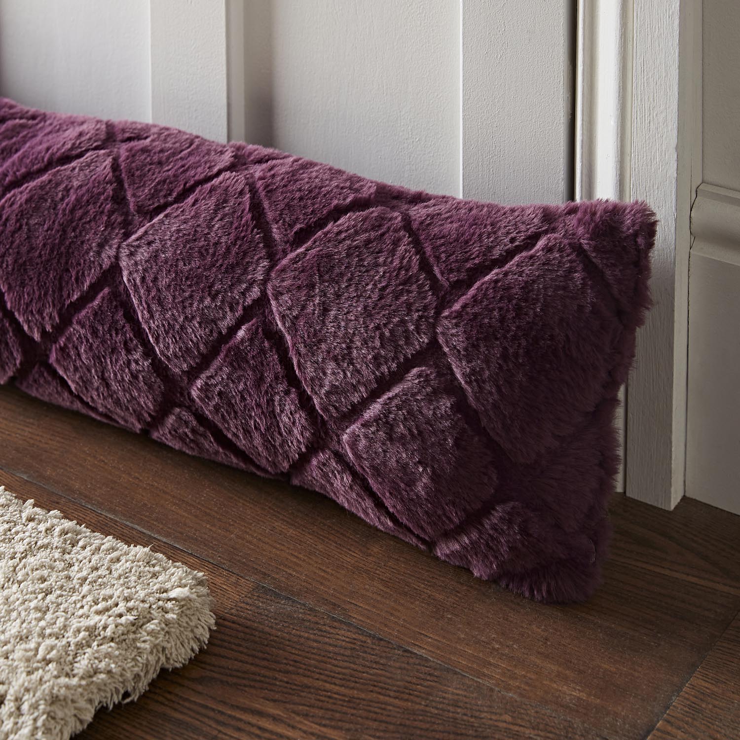 Catherine Lansfield Draught Excluder 90cm x 20cm - Plum 2 Shaws Department Stores