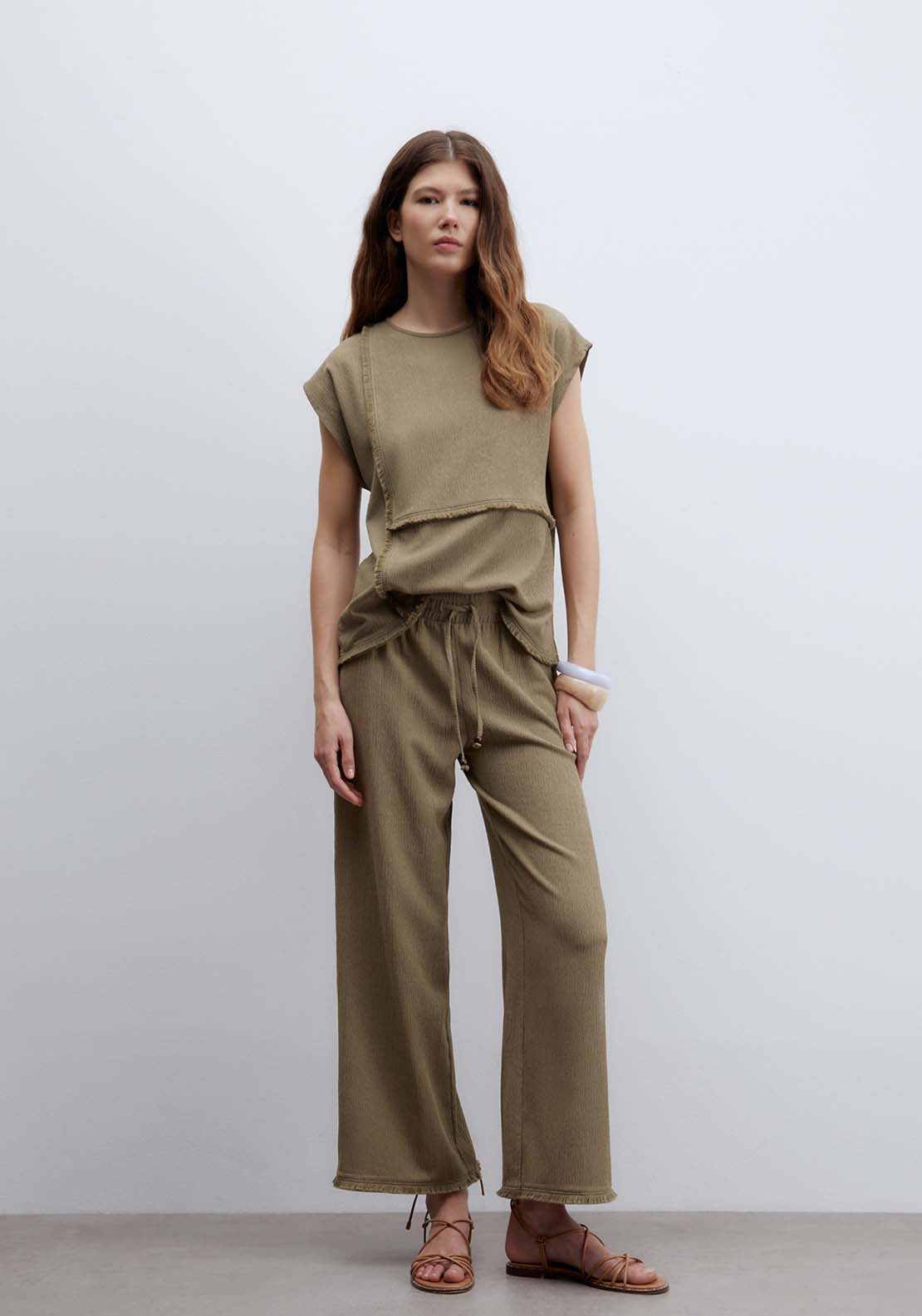 Fringe Hem Textured Trousers - Beige