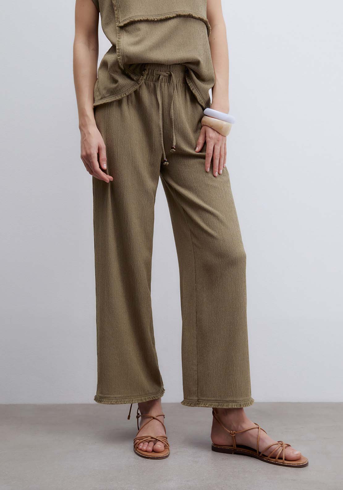 Fringe Hem Textured Trousers - Beige