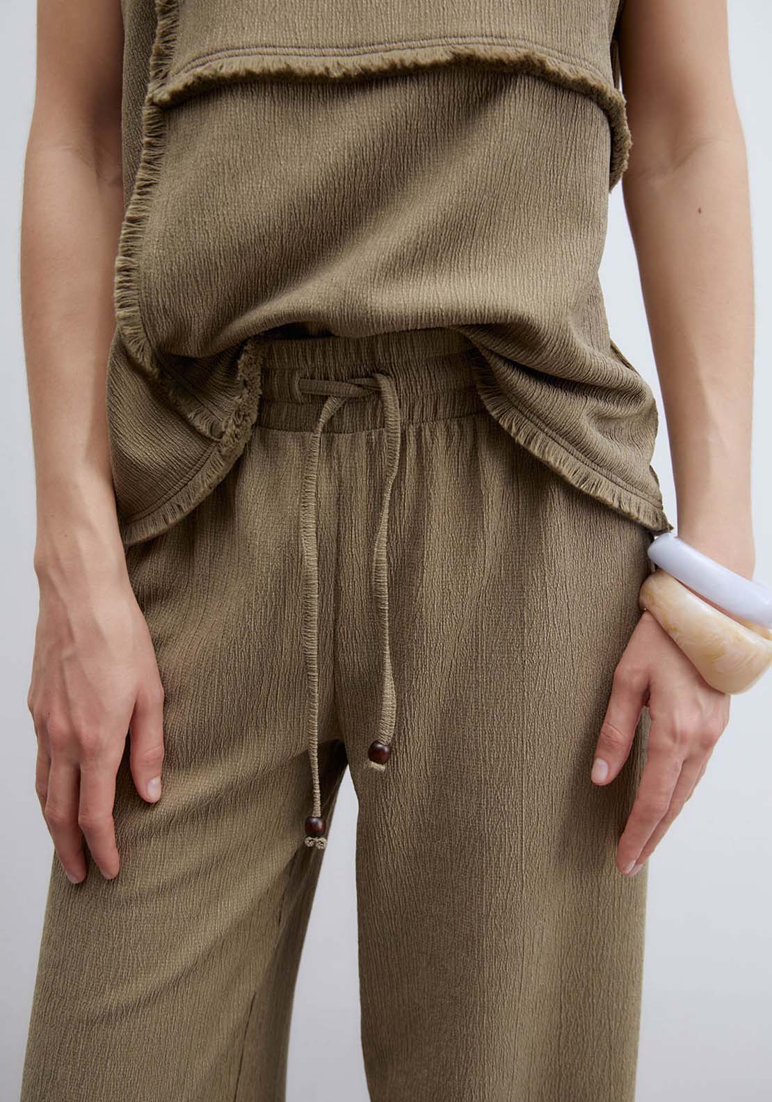 Fringe Hem Textured Trousers - Beige