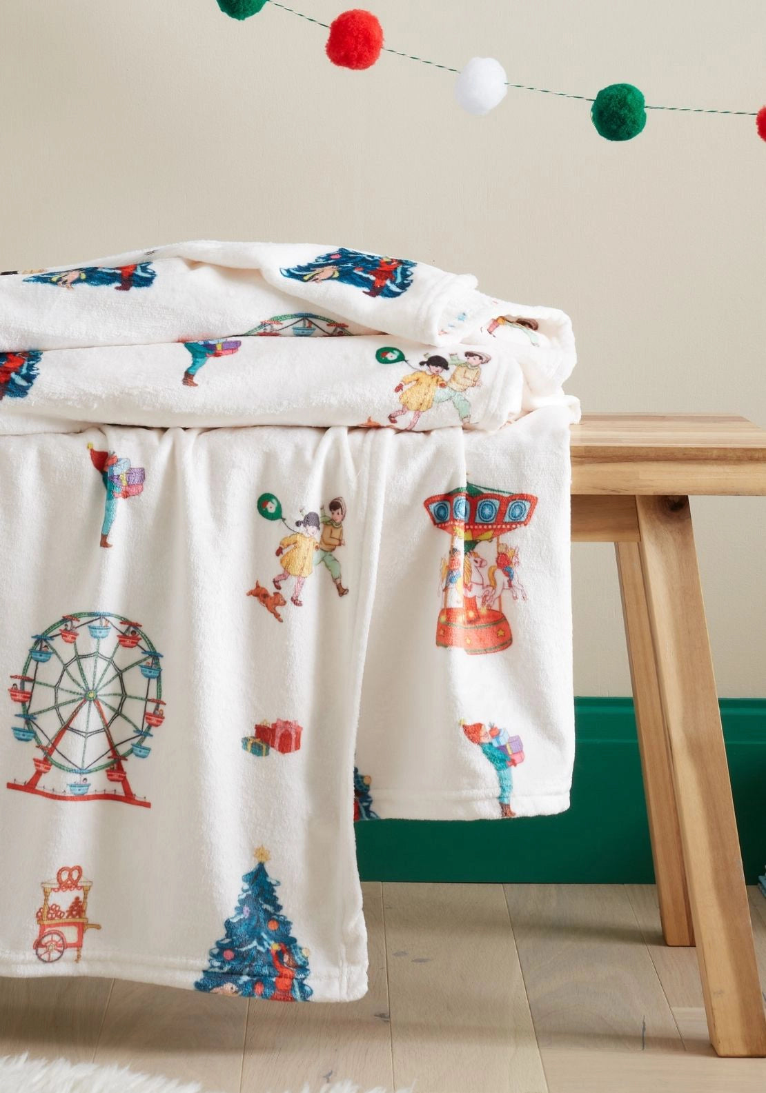 Belle &amp; Boo Christmas Fairground Cosy Fleece Blanket Throw - Green 1 Shaws Department Stores