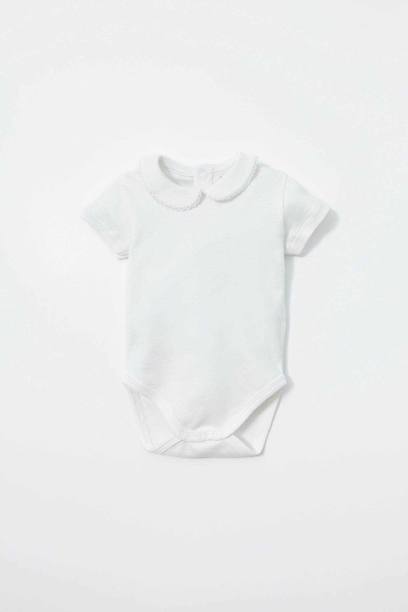 Sfera Round-neck cotton romper - White 1 Shaws Department Stores