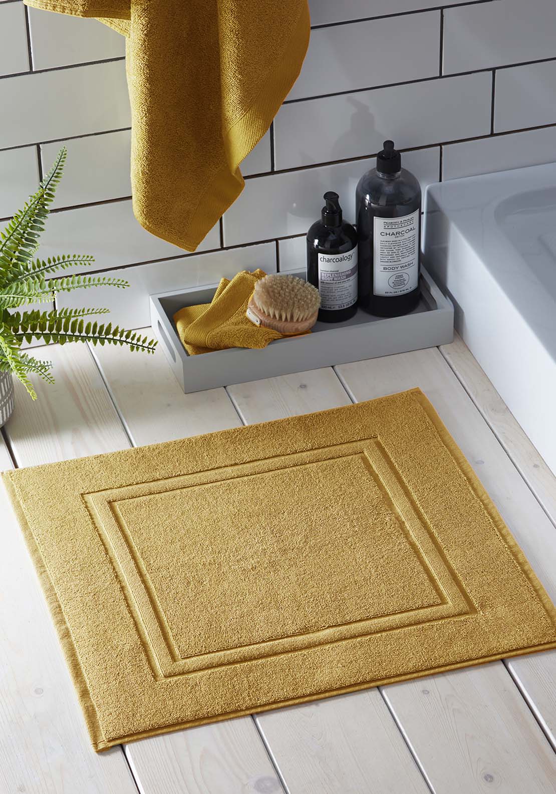 The Home Luxury Collection Friendly Towel Bath Mat - Ochre 1 Shaws Department Stores