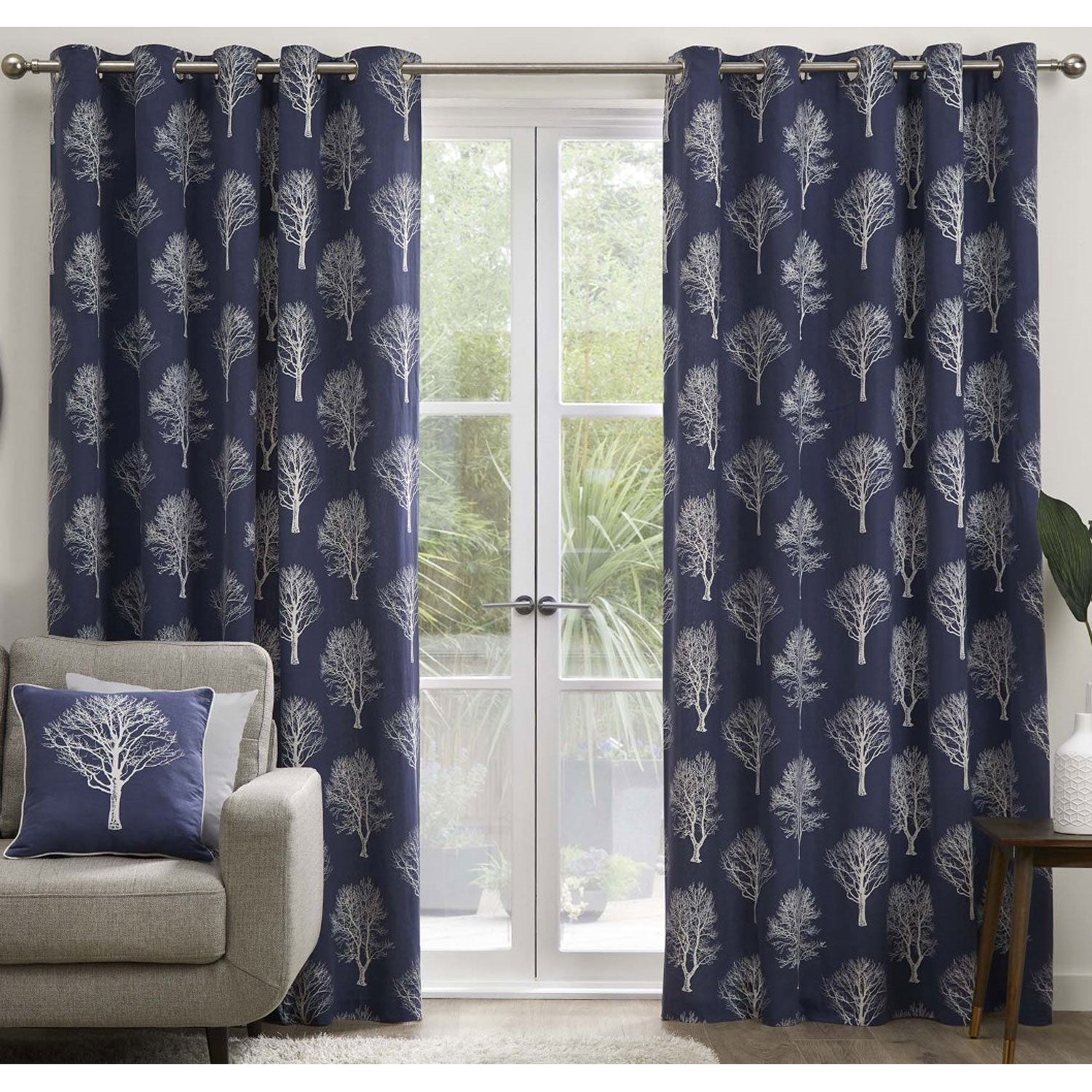 The Home Bedroom Woodland Trees Eyelet Curtains - Navy 1 Shaws Department Stores